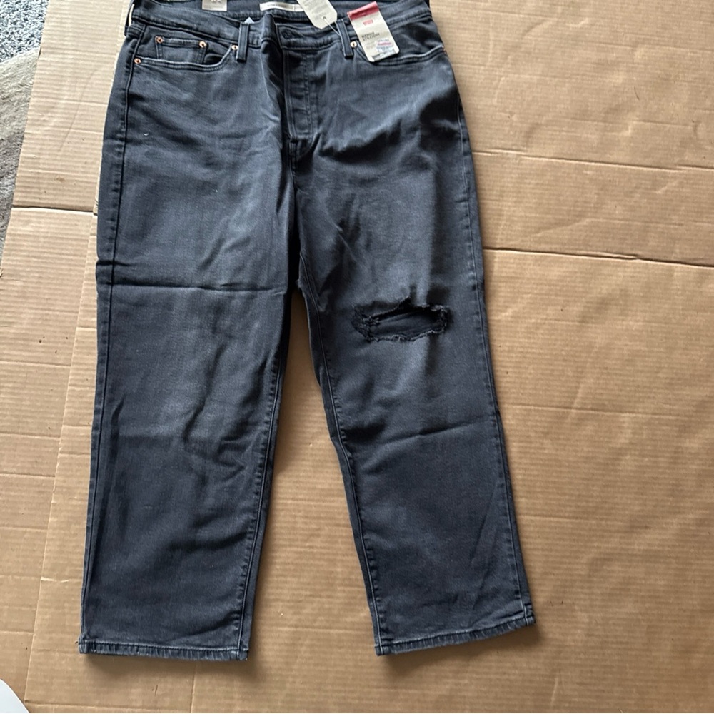 Levi's Women's Straight Leg Jeans in Washed Black with Knee Distress